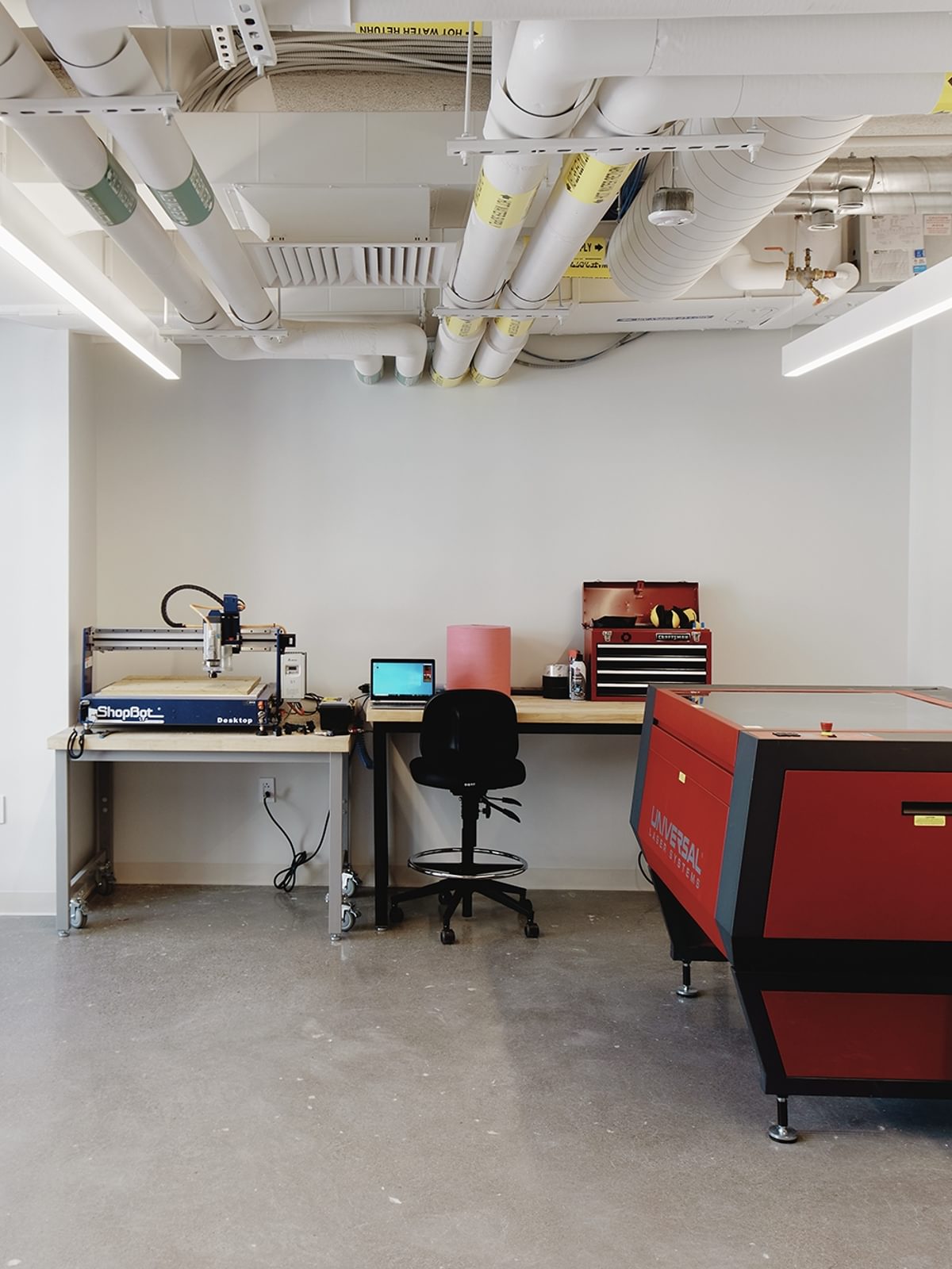 The Engine's rapid fabrication shop includes laser cutters, a thermoformer, a desktop router, and a thermal camera.