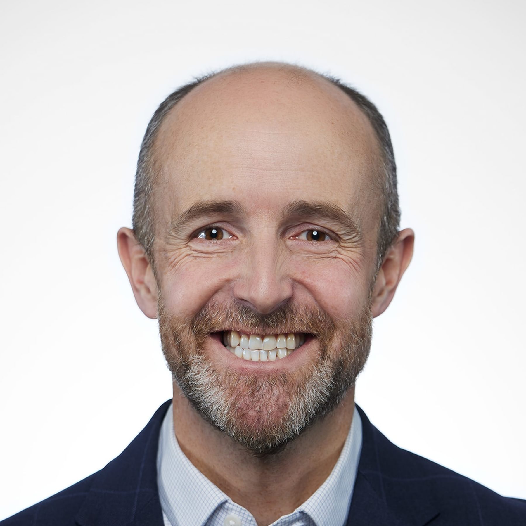 A headshot of The Engine's Chief Growth Officer Ben Downing.