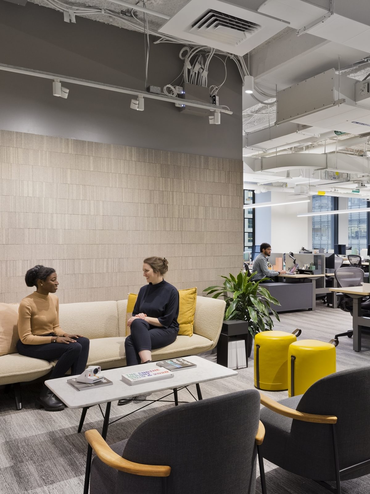 Tough Tech teams work in their private office space at The Engine