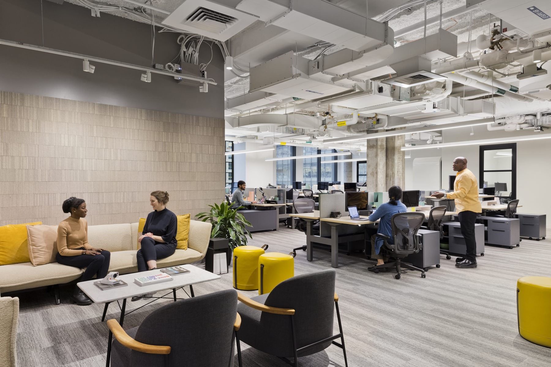 Tough Tech teams work in their private office space at The Engine