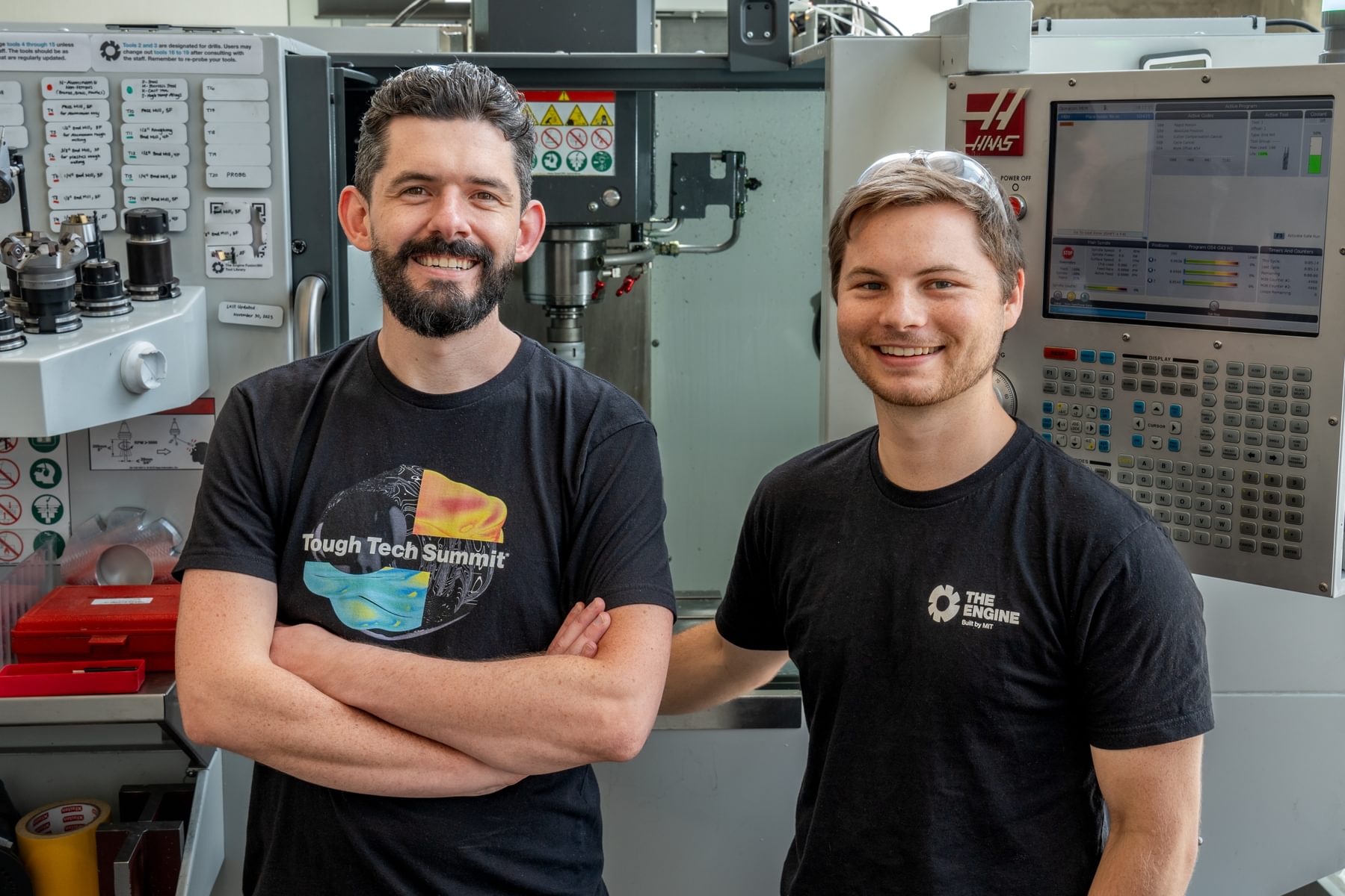 The Engineering team at The Engine poses for a photo in the machine shop.