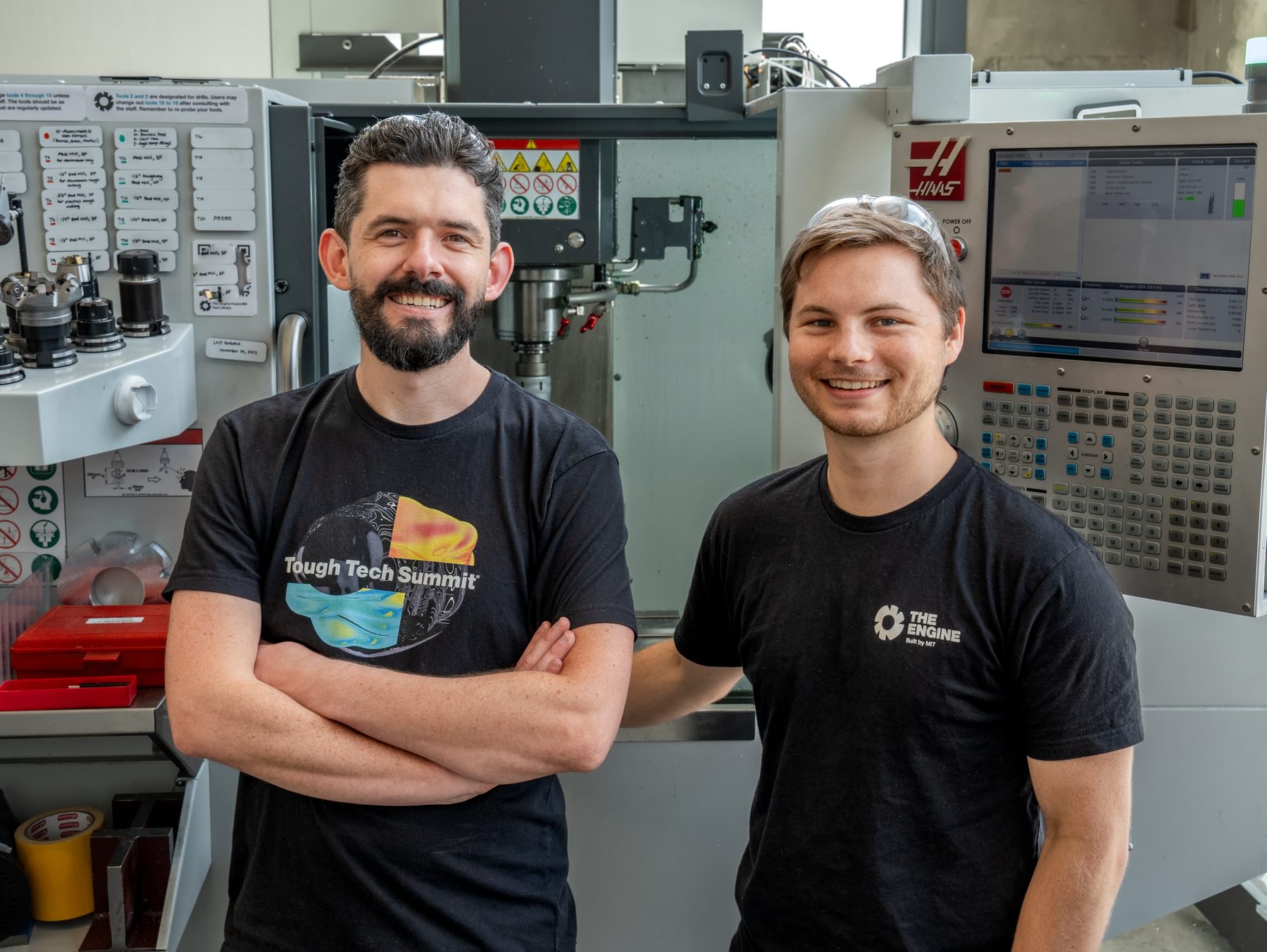The Engineering team at The Engine poses for a photo in the machine shop.